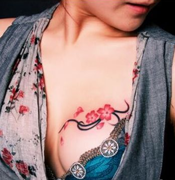 yakanaka chest chest plum tattoo. 