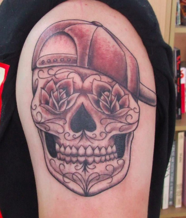 Schouder Mexicaanse glimlach schedel tattoo patroon.